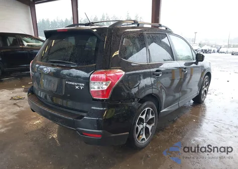 2014 Subaru Forester 2.0Xt Touring z USA, uszkodzony, nr VIN JF2SJGMC7EH529975